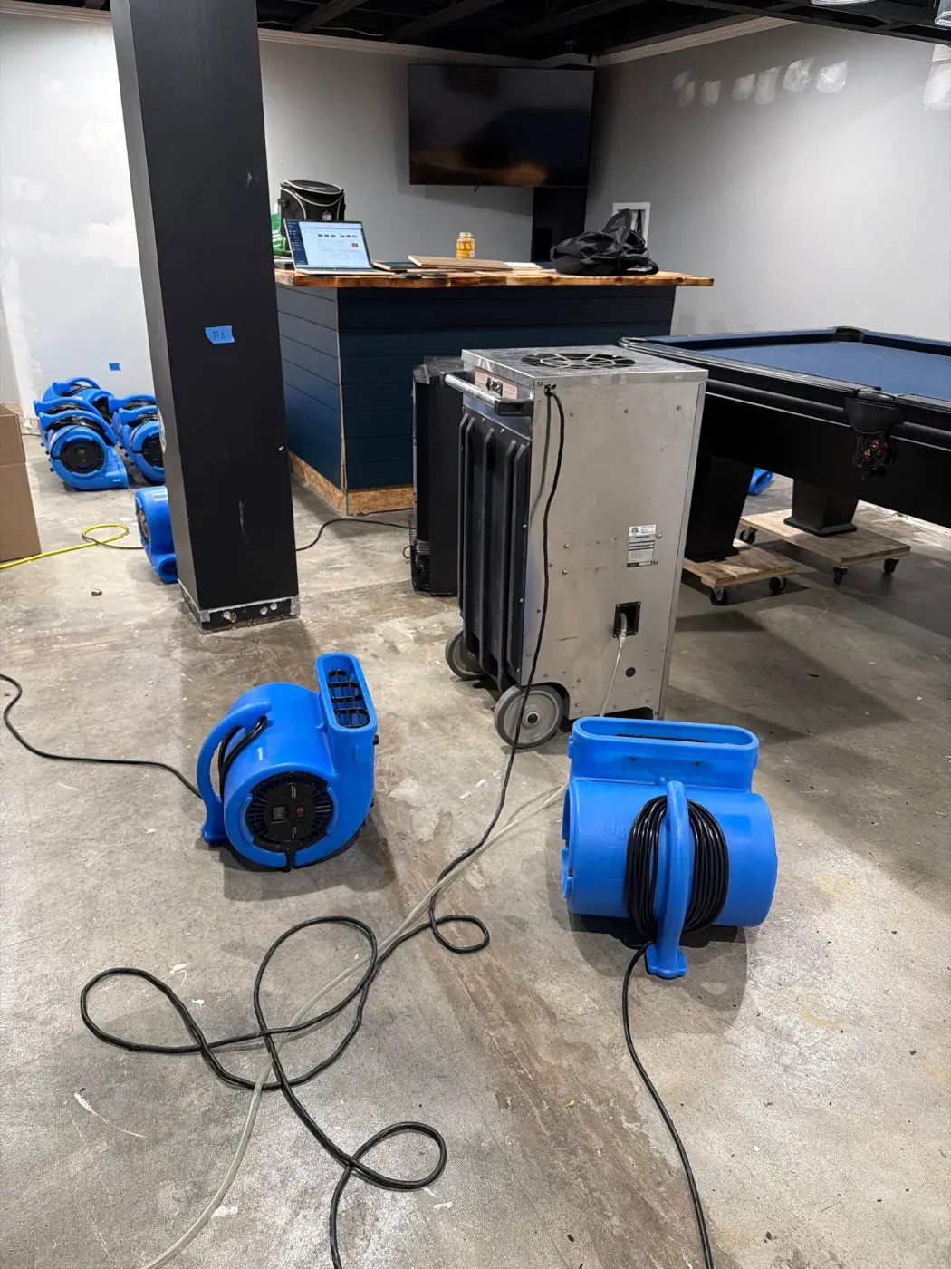 Sump pump backup water removal in Greensburg residential basement